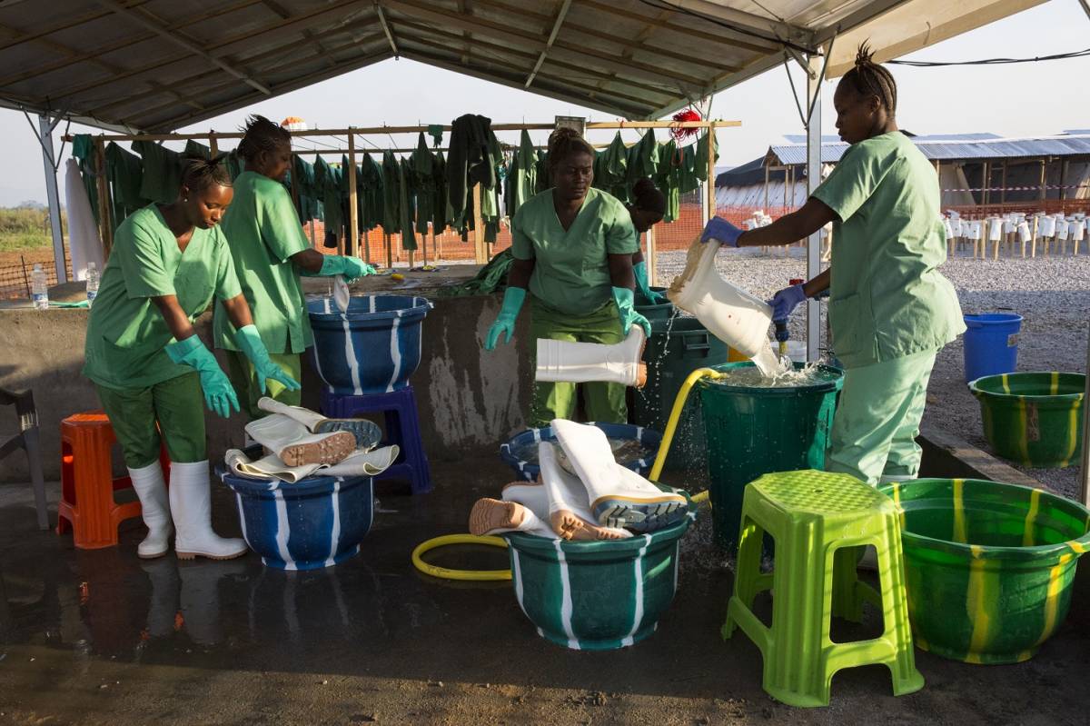 An image of healthcare staff working at an ebola treatment centre in Sierra Leone. . 