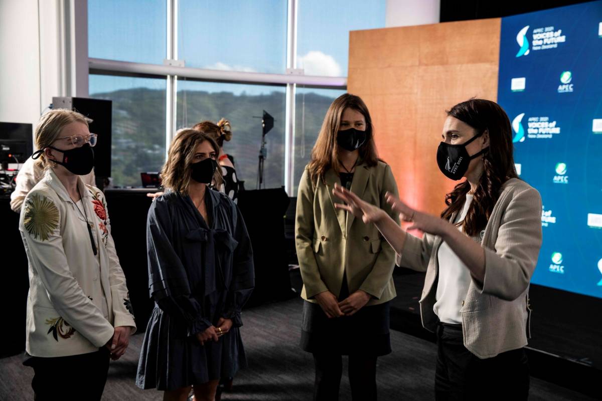 Prime Minister Jacinda Ardern talking to three Voices of the Future representatives..