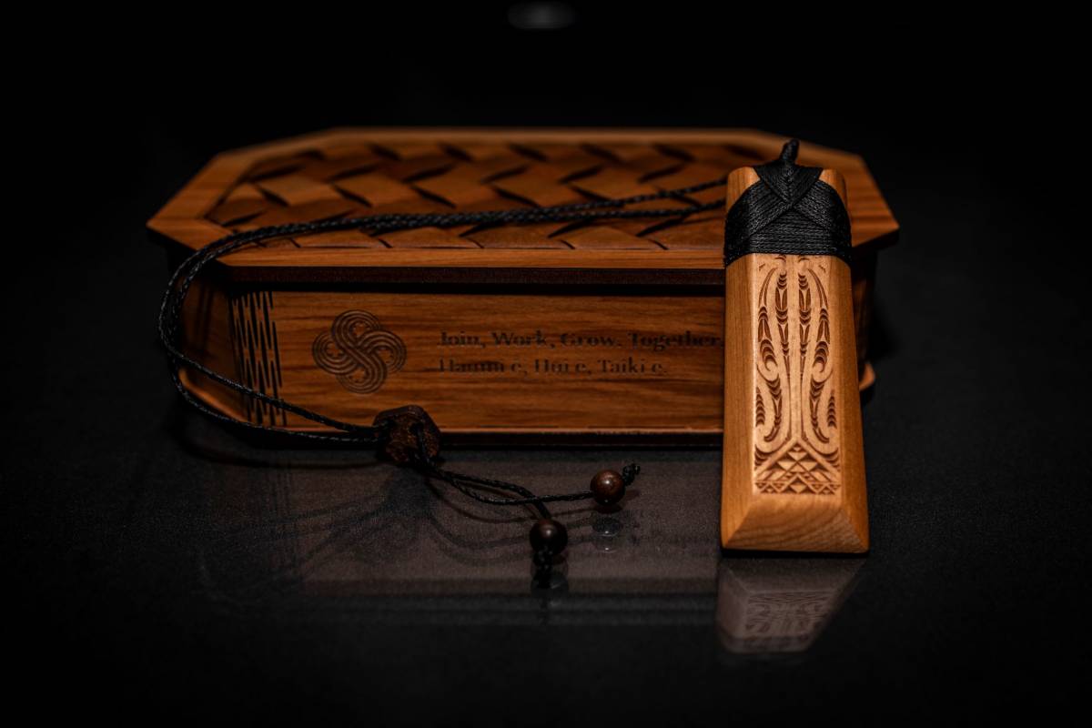 Close up of a wooden toki in a wooden gift box.