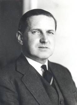 A head shot of Alister McIntosh..
