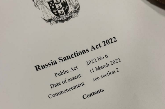 An image of a piece of paper which reads "Russian Sanctions Act 2022"..