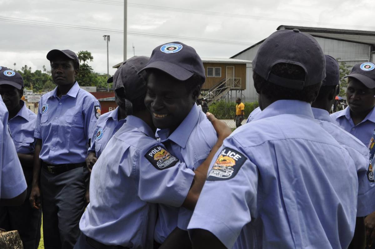 New female police officers graduating from training, Bougainville, Papua New Guinea.