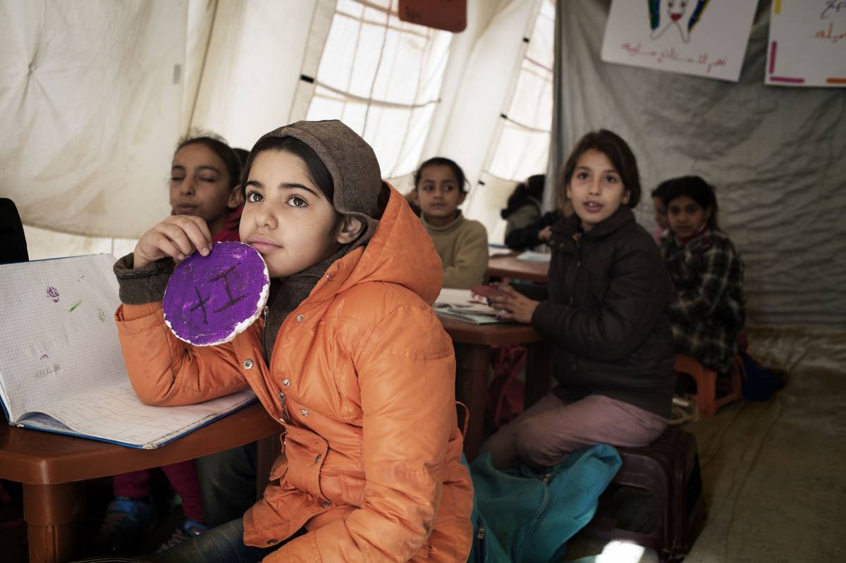Syrian refugees attending school.