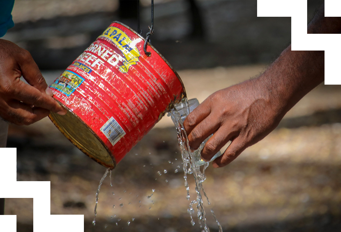 A watering can.