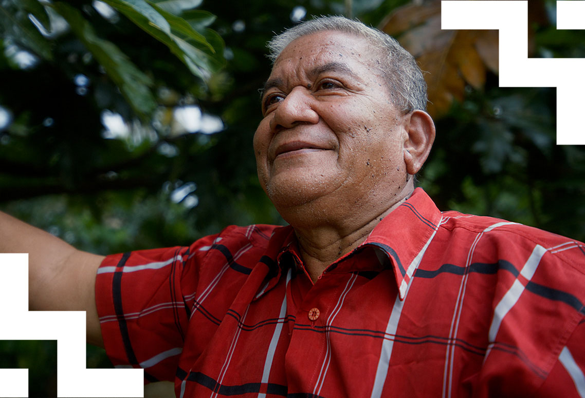 A man wearing a red shirt. 