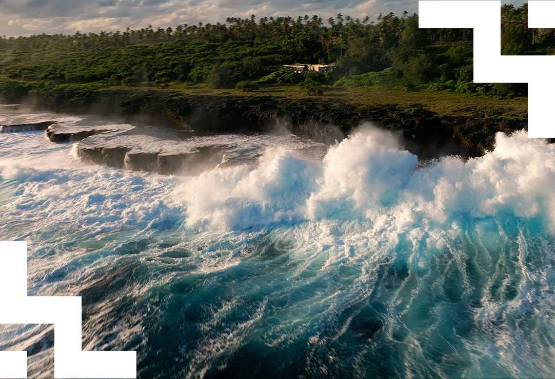 Waves crashing against the shoreline. 