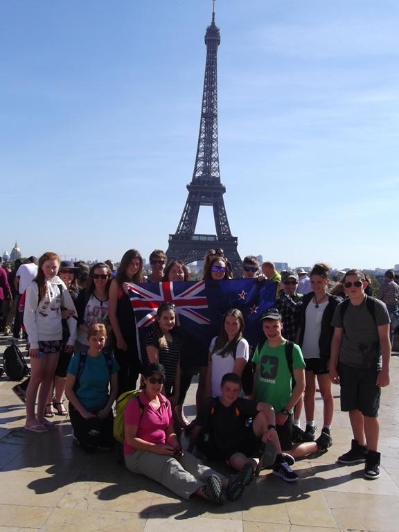 A group of students visiting the Eiffel Tower in Paris, France. 