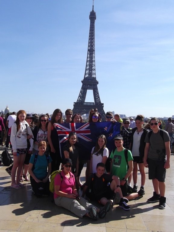 A group of students visiting the Eiffel Tower in Paris, France.